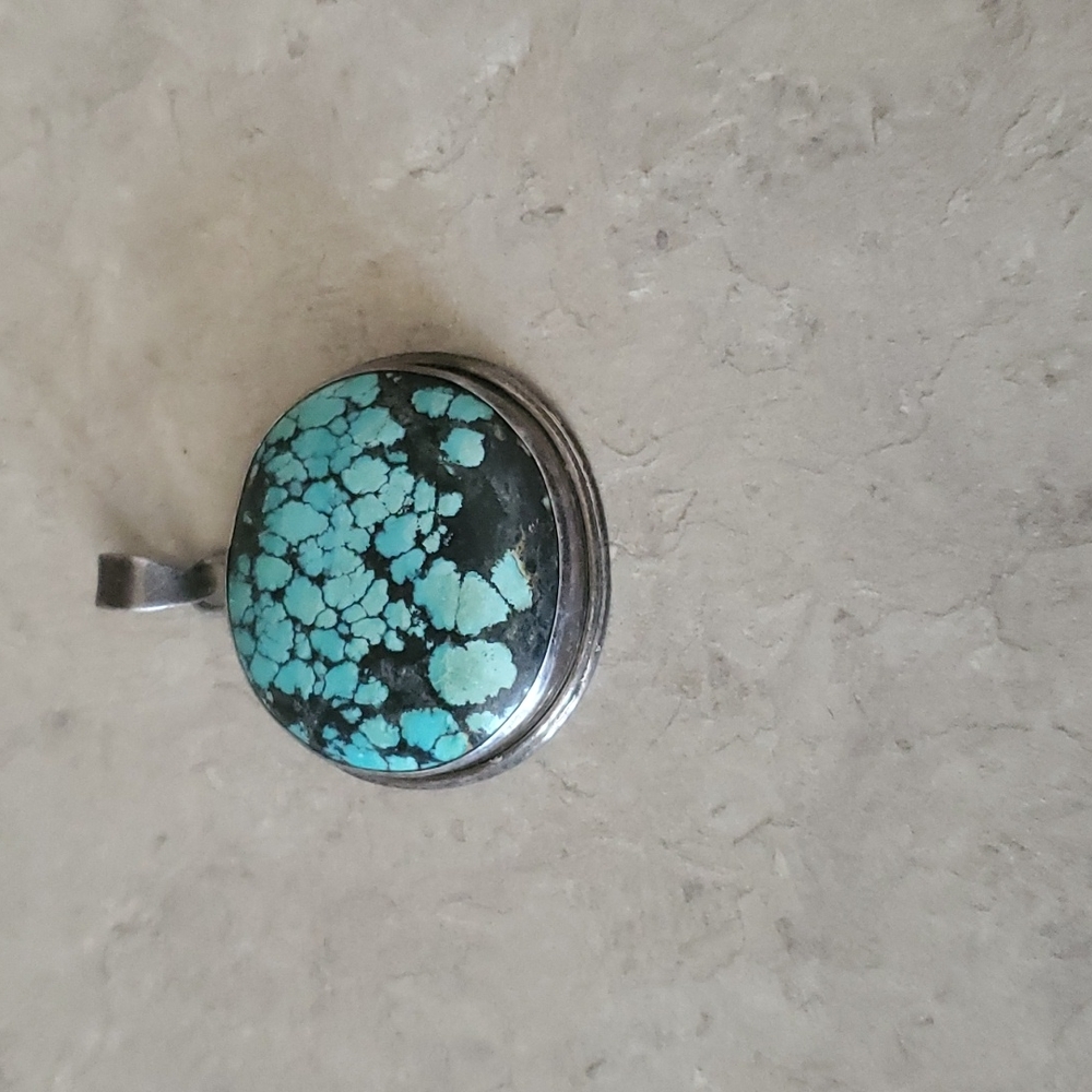 Turquoise solid pendant 925 silver.